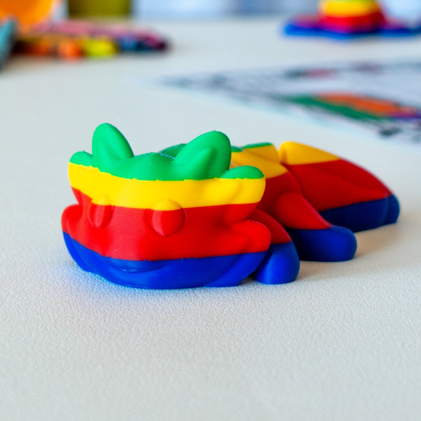Gloam viewed from a flat-lay angle, highlighting its articulated shape and smooth finish