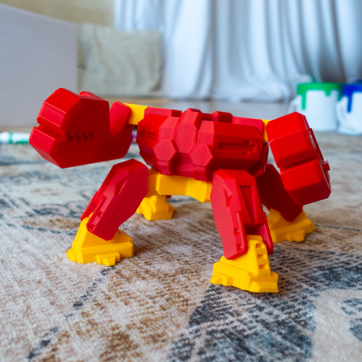 Alternate carpet shot of Clampp mid-crawl, highlighting part articulation and sturdy play design