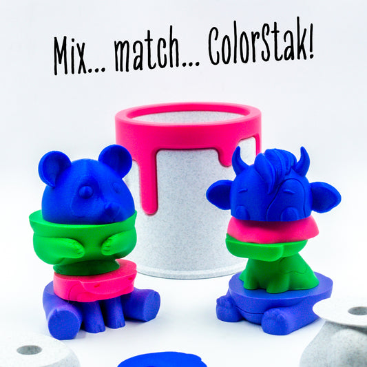 Mooch the cow and Munch the panda mixed with pieces partially rotated to show creative mixing potential with other ColorStaks