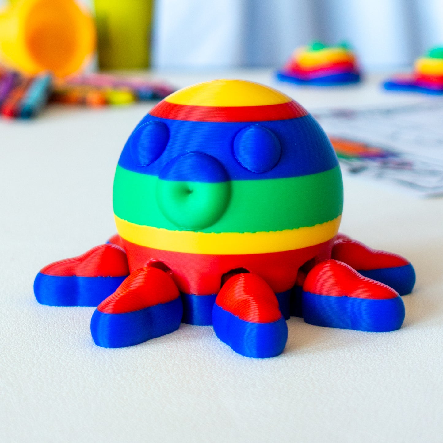 Inks the octopus toy posed upright, showing its balanced body and expressive design