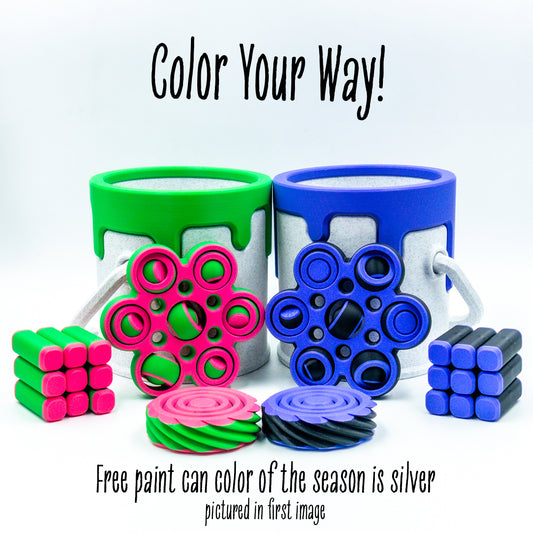 Studio shot of 2 Scifi Packs each showcasing 3 fidget toys and a paint can with articulated design and tactile details.