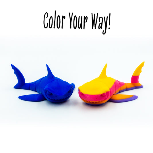 Chomps the shark toy in a group shot to show customization options