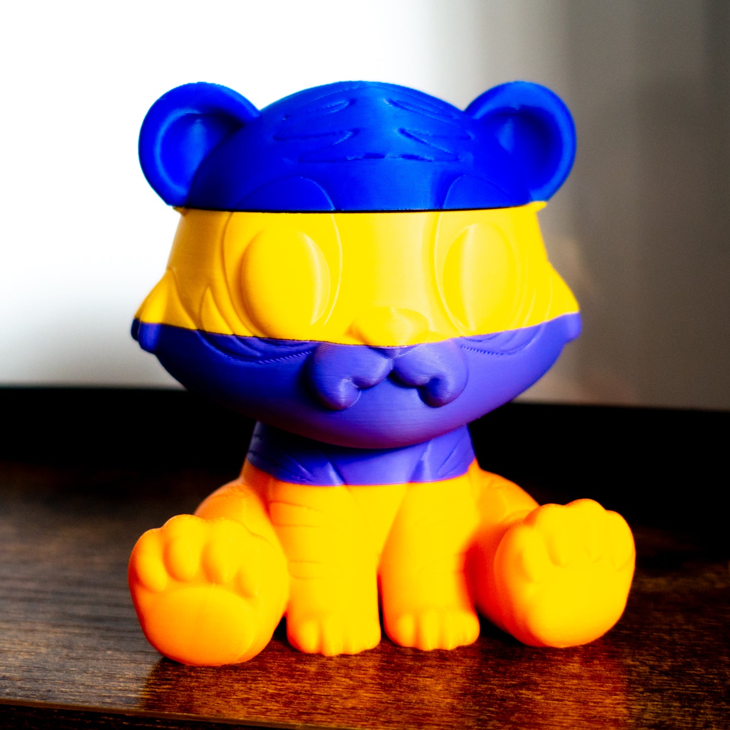 Roar the tiger shown fully stacked in four satisfying slices, ideal for tactile desk play