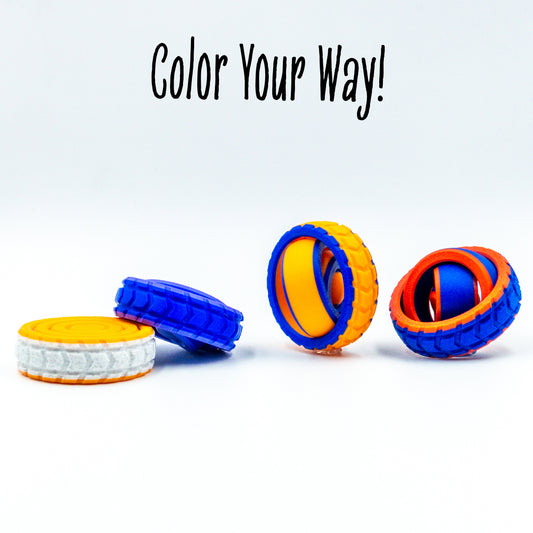 Studio photo of Tire Fidget Spin with articulated design and tactile details.