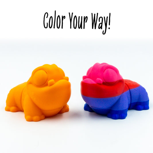 Zorb Alien Pet two colorways of this customizable animal figure shown with 'color your way!'—perfect for mix-and-match creativity