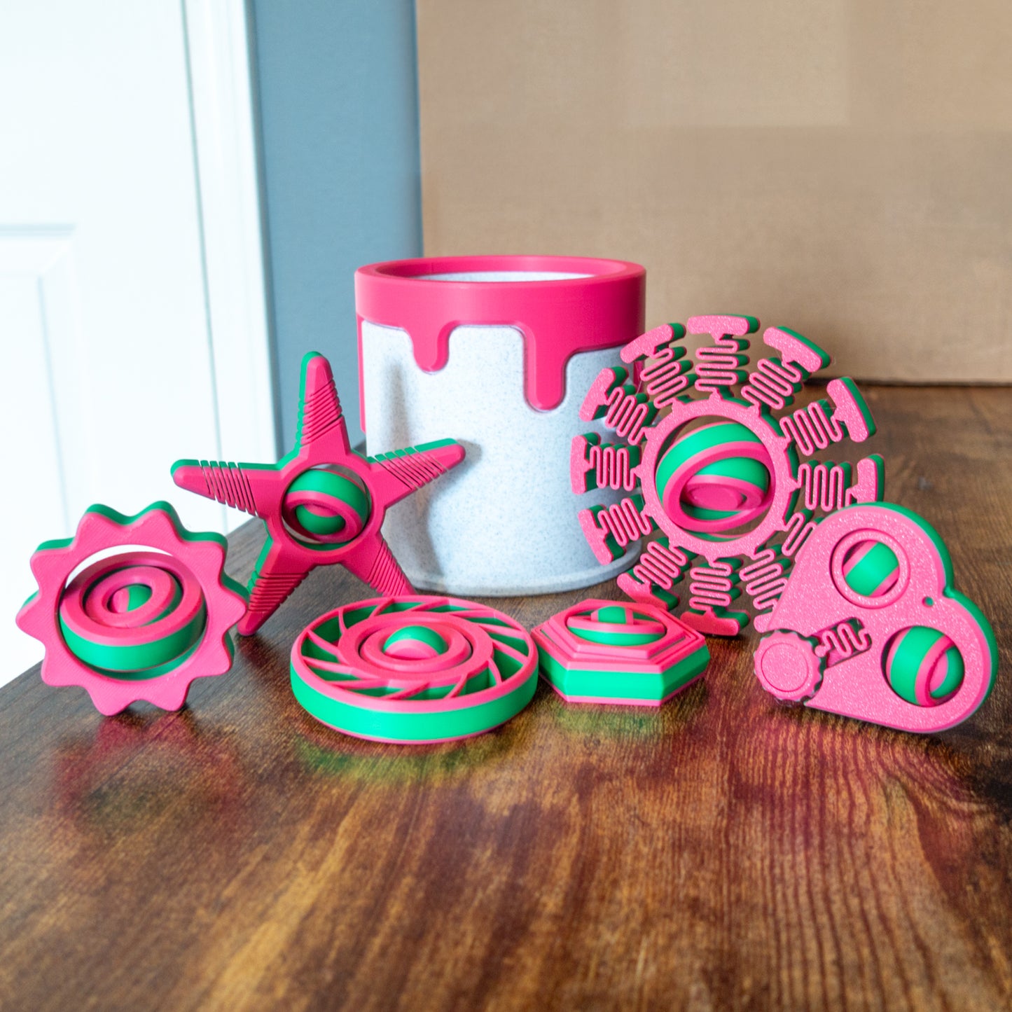 SIX FIDGETS AND A CUSTOMIZED PAINT CAN