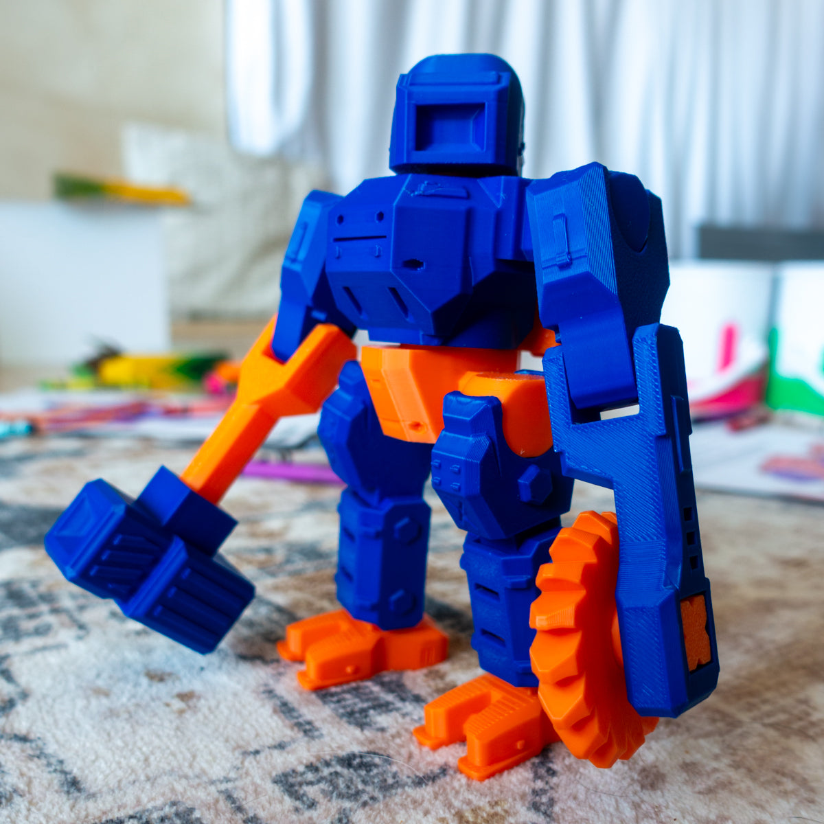 Alternate view of Chief Chroma mid-action on a cozy carpet, demonstrating modular articulation designed for mixing and posing in endless ways