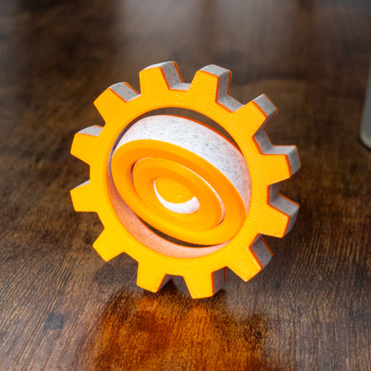 Alternative lifestyle image of Cog Spin with articulated design and tactile details.