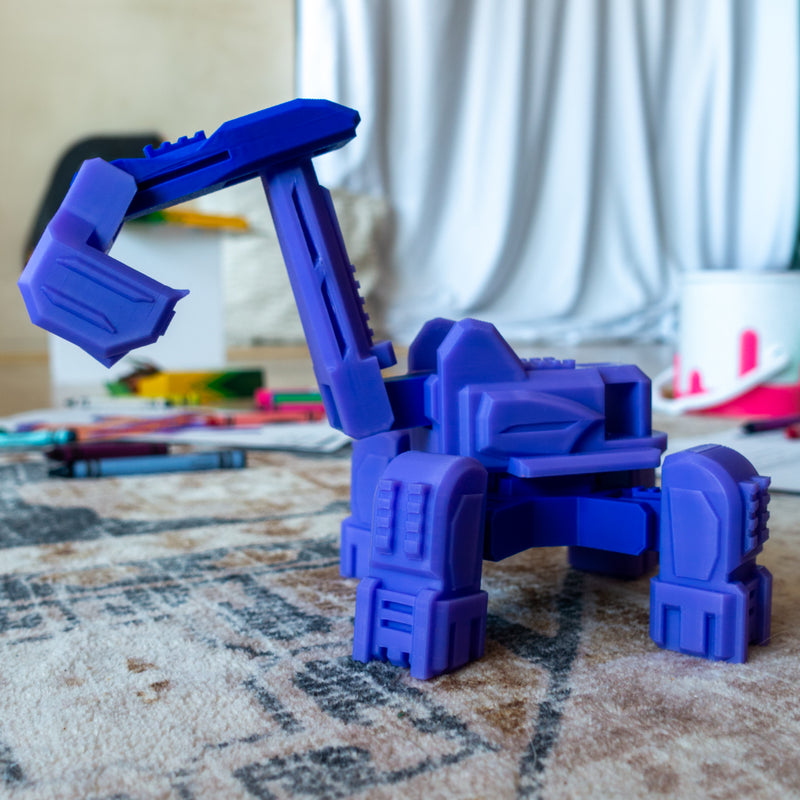 Diggs the Excavator posed on carpet mid-dig, showcasing textured standing legs and adjustable scoop