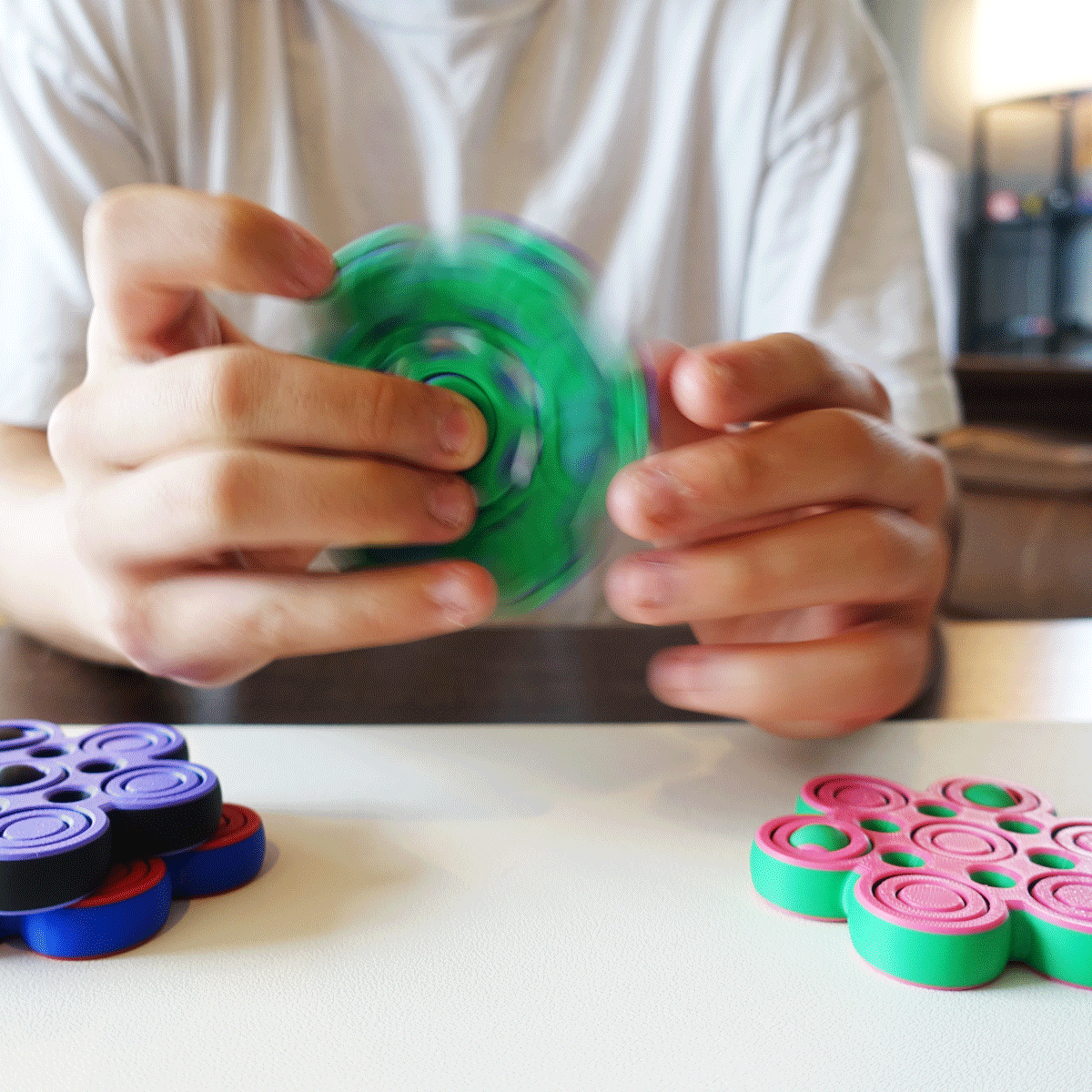 A gif showing the motion of the hexa gyro fidget spinner and the satisfying motion in someone's hands.