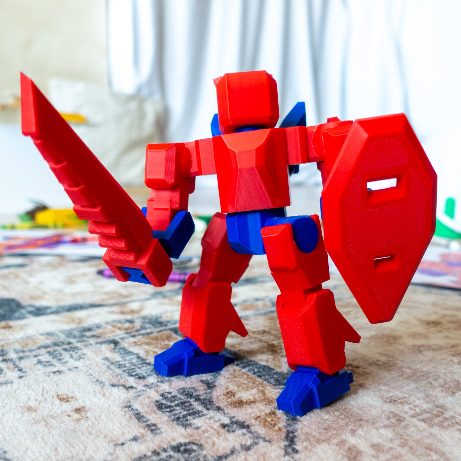 Hue Hero posed on a carpet, showing fully articulating limbs and modular joints made for creative configuration and storytelling