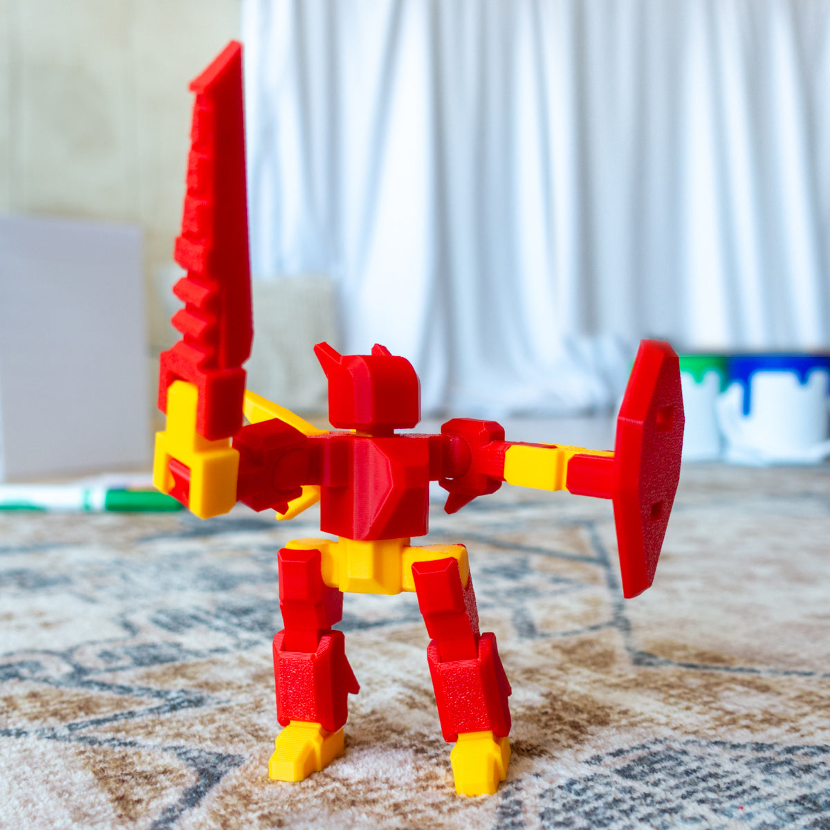 Hue Hero posed in a third custom colorway, showcasing textured surface details and articulation built for part-swapping and imaginative upgrades