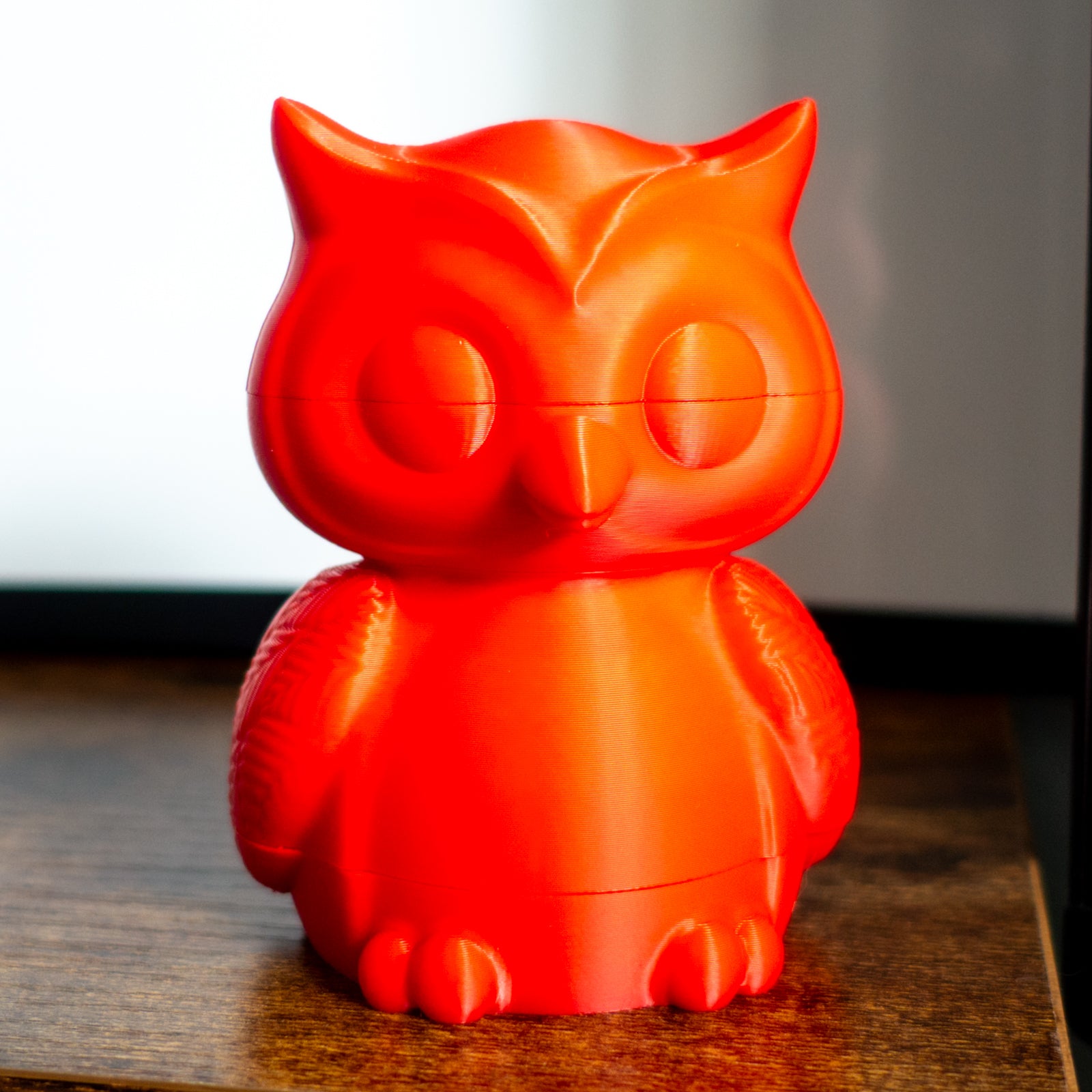 Another Hoot the owl shown fully stacked in four satisfying slices on a desk