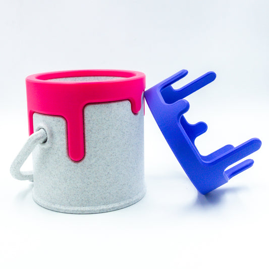 A second paint can and its alternate swappable color drip.
