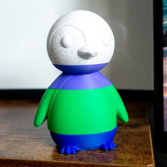 Waddle the penguin shown fully stacked in four satisfying slices, ideal for tactile desk play