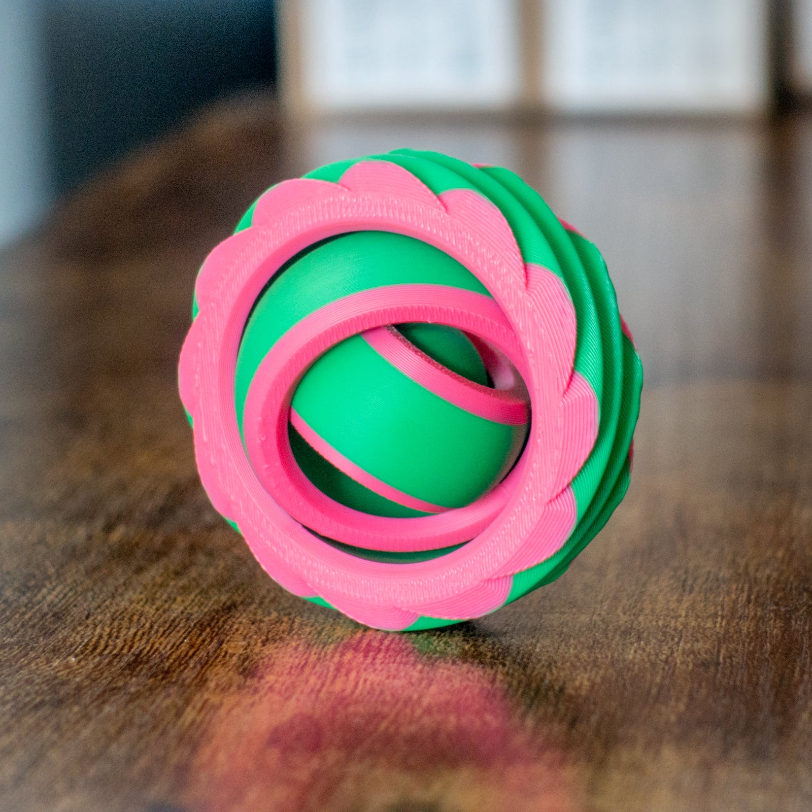 Portalspinner fidget in a natural setting, highlighting articulated design and tactile details.