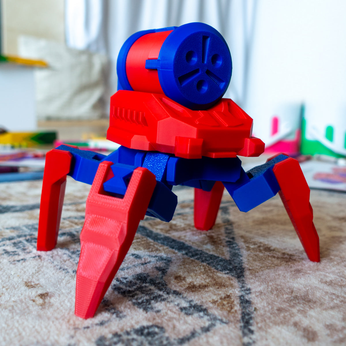 Refewl the Paint Bot toy posed on carpet, showing paint can nozzle arm and fully poseable limbs for imaginative color missions