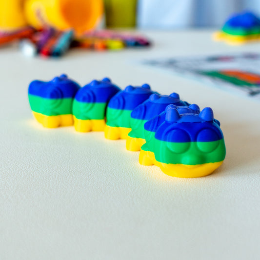 Main view of the articulated animal toy showing tactile textures