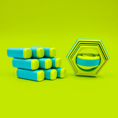PixelCube and CoreShift fidget toys in neon green and aqua blue on a neon green backdrop.