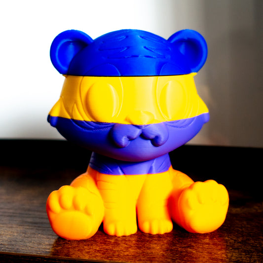 Roar the tiger shown fully stacked in four satisfying slices, ideal for tactile desk play